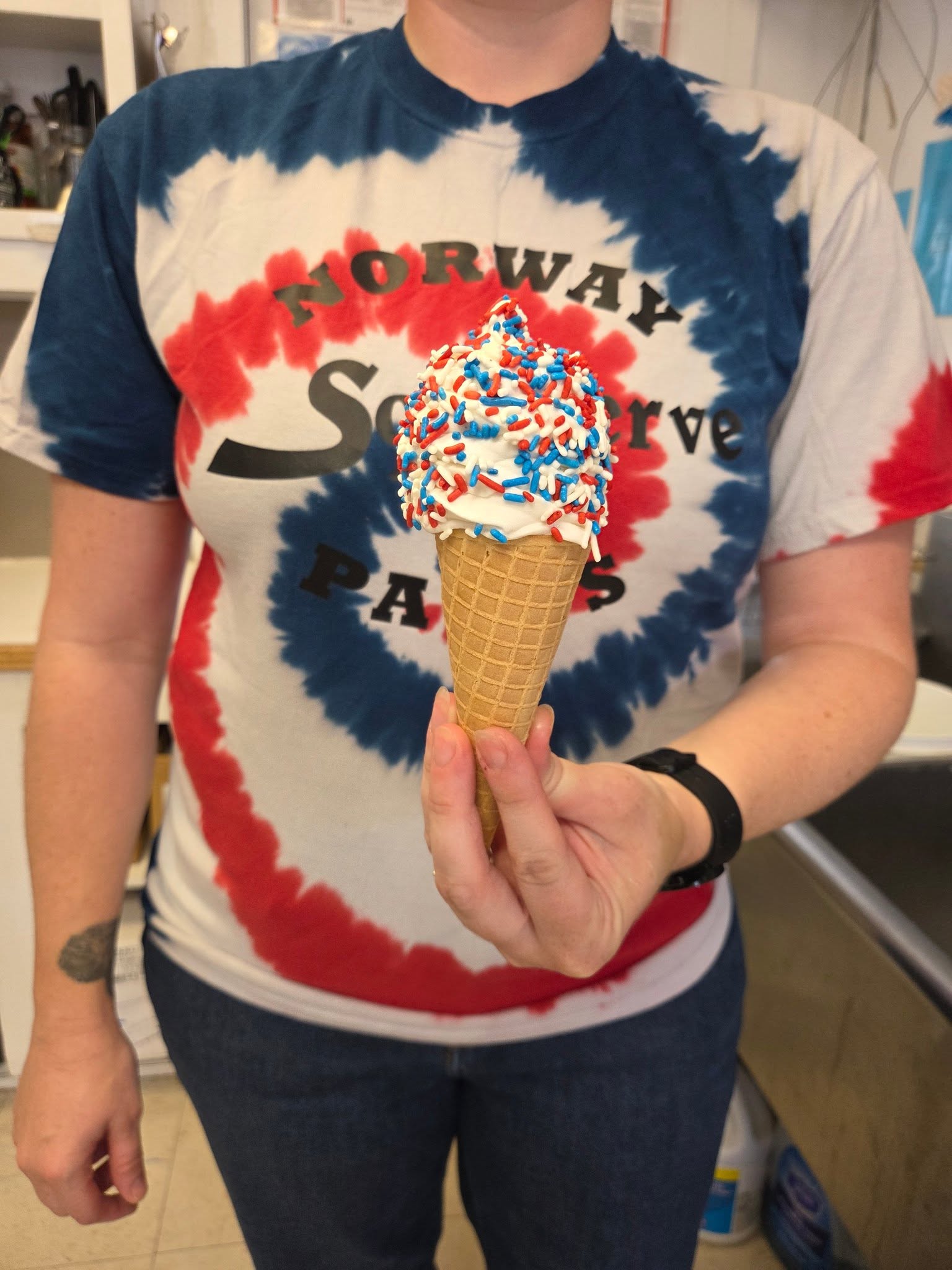Patriotic soft serve with red white and blue sprinkles